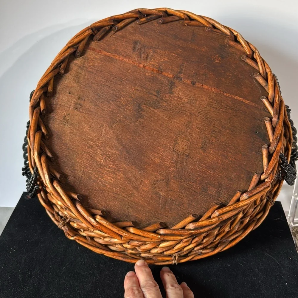 Vintage Decorative Woven Basket with metal and wood Handles. Hand painted